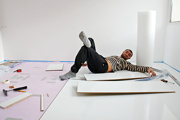 Image showing Worker relax