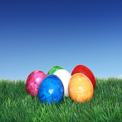 Image showing Colorful eggs on green grass 