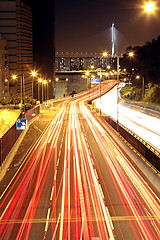 Image showing traffic through downtown at night 
