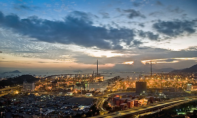 Image showing Port warehouse with cargoes and containers at night 