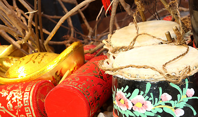 Image showing Firecrackers and a Chinese Traditional Wooden Drum 