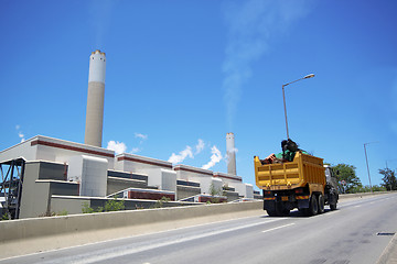 Image showing coal fired power station and car moving