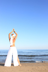 Image showing  woman relaxing on the beach