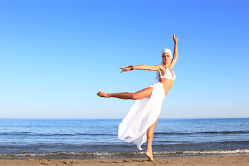 Image showing  woman relaxing on the beach