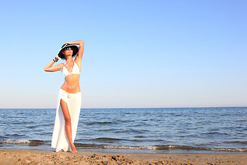 Image showing  woman relaxing on the beach