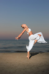 Image showing  woman relaxing on the beach