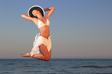 Image showing  woman relaxing on the beach