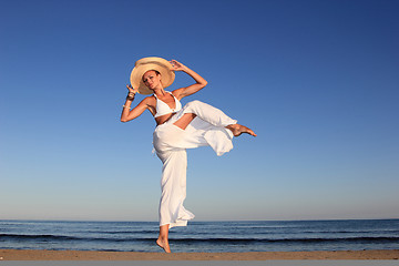 Image showing  woman relaxing on the beach