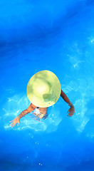 Image showing woman enjoying a swimming pool