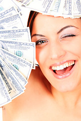 Image showing Young happy woman with dollar
