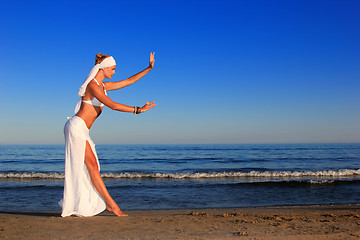 Image showing  woman relaxing on the beach