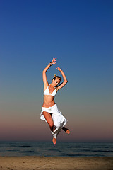 Image showing  woman relaxing on the beach