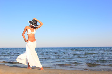 Image showing  woman relaxing on the beach