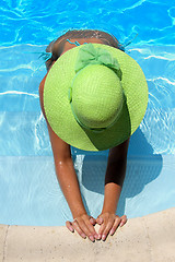 Image showing Young woman in a swimming pool