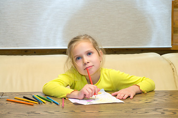 Image showing Girl has thought of drawing.