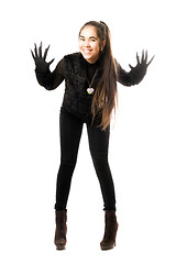 Image showing Playful young brunette in gloves with claws