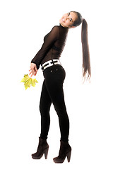 Image showing Beautiful young brunette in a black pants