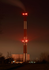 Image showing Illuminated chimney at night