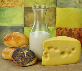 Image showing milk bottle , cheese and fresh rolls