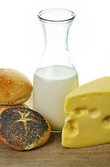 Image showing milk bottle , cheese and fresh rolls