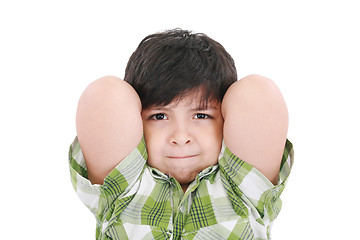 Image showing Close up portrait of a young boy child smiling with arms up behi