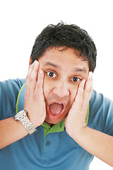 Image showing Young man has opened mouth from surprise, isolated on white back