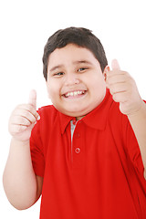Image showing Thumbs up shown by a happy young boy 
