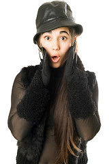 Image showing Portrait of surprised girl in gloves with claws