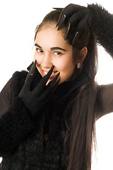 Image showing Portrait of joyful young woman in gloves