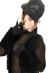 Image showing Portrait of beautiful girl in gloves with claws