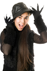 Image showing Cheerful girl in gloves with claws. Isolated