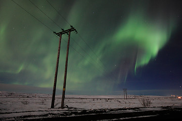 Image showing Aurora over the electrical wires