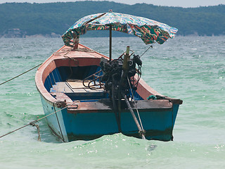 Image showing Longtail boat moored at sea in Thailand