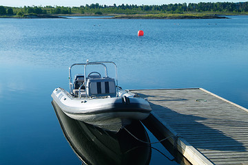 Image showing Rigid inflatable boat at a pier
