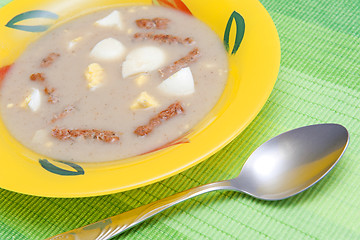 Image showing Soup with sausages and eggs