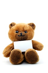 Image showing isolated teddy with blank sheet