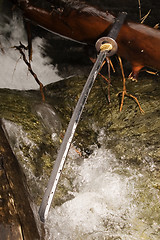 Image showing Katana and water