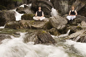 Image showing Two man meditating after practice