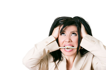 Image showing Stressed woman looking up