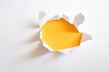 Image showing yellow hole in paper