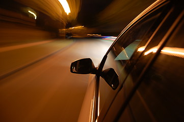 Image showing night drive with car in motion 