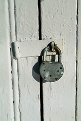 Image showing Detail of door with padlock