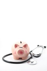 Image showing stethoscope and piggy bank