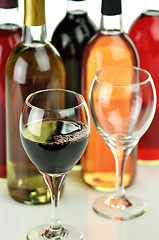 Image showing assortment of wine bottles and glasses