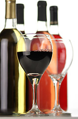 Image showing assortment of wine bottles and glasses