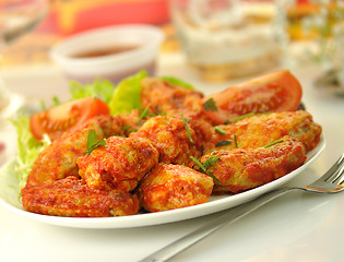 Image showing hot chicken wings with salad