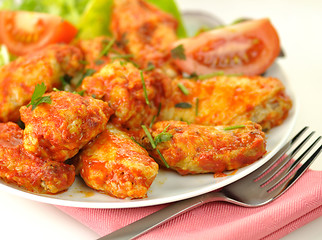 Image showing hot chicken wings with salad