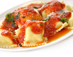 Image showing Ravioli pasta with red tomato sauce