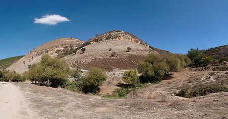 Image showing Twin round hills among Mediterranean landscape