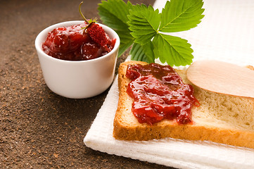 Image showing Wild strawberry jam with toast